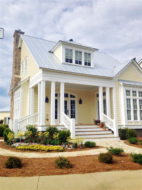 metal roof color for yellow house|yellow house with gray roof.